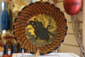 “Fairy Basket” – NC Long Leaf Pine needles, woven by hand and enhanced with a Fairy ornament