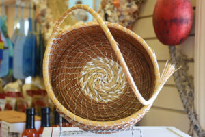 “Pine Needle Basket w/handle” – NC Long Leaf Pine needles, woven by hand